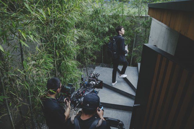 A group of people in a park

Description automatically generated